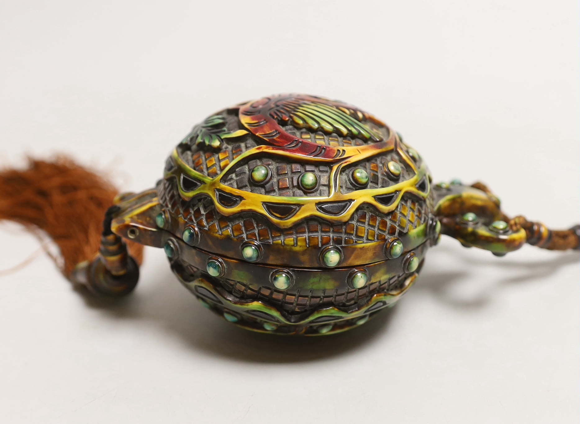 A spherical Cross purse